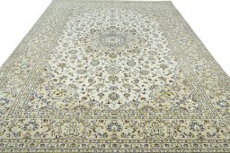 Surface texture of New Kashan rug with natural Wool and intricate pattern