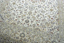 Close-up detail of New Kashan rug from Iran / Persia showing Wool weave