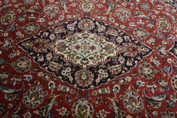 Central medallion detail of 2000s Kashan rug from Iran / Persia