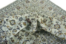 Surface texture of 2000s Kashan rug with natural Wool and intricate pattern