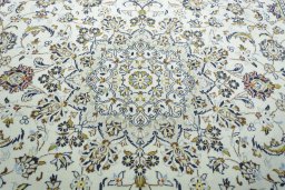 Central medallion detail of 2000s Kashan rug from Iran / Persia