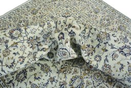 Surface texture of 2000s Kashan rug with natural Wool and intricate pattern