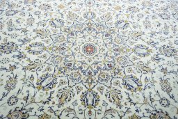 Central medallion detail of 2000s Kashan rug from Iran / Persia