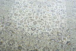 Close-up detail of 2000s Kashan rug from Iran / Persia showing Wool weave