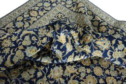 Surface texture of 2000s Kashan rug with natural Wool and intricate pattern