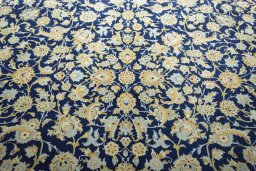 Central medallion detail of 2000s Kashan rug from Iran / Persia