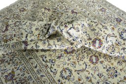 Surface texture of 2000s Kashan rug with natural Wool and intricate pattern