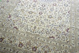 Close-up detail of 2000s Kashan rug from Iran / Persia showing Wool weave