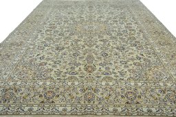 Surface texture of 2000s Kashan rug with natural Wool and intricate pattern