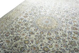 Backside of handmade 2000s Kashan rug showing knot structure and weave density