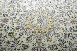 Central medallion detail of 2000s Kashan rug from Iran / Persia