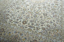 Close-up detail of 2000s Kashan rug from Iran / Persia showing Wool weave