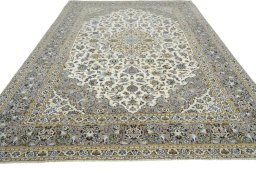 Surface texture of 2000s Kashan rug with natural Wool and intricate pattern