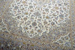 Close-up detail of 2000s Kashan rug from Iran / Persia showing Wool weave