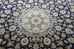 Central medallion detail of 2000s Kashan rug from Iran / Persia