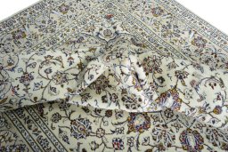 Surface texture of 2000s Kashan rug with natural Wool and intricate pattern