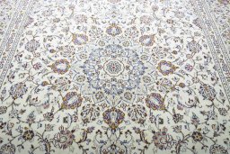 Central medallion detail of 2000s Kashan rug from Iran / Persia