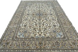 Surface texture of 2000s Kashan rug with natural Wool and intricate pattern