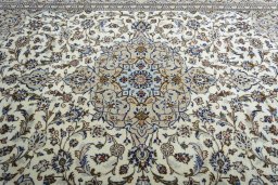Central medallion detail of 2000s Kashan rug from Iran / Persia