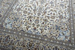 Close-up detail of 2000s Kashan rug from Iran / Persia showing Wool weave