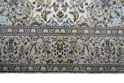 Full view of 2000s Kashan rug from Iran / Persia, 298 × 191 cm in Beige tones