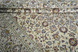 Close-up detail of 2000s Kashan rug from Iran / Persia showing Wool weave