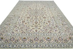 Surface texture of 2000s Kashan rug with natural Wool and intricate pattern