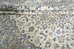 Close-up detail of New Kashan rug from Iran / Persia showing Wool weave