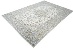 Corner detail of New Kashan rug showing border pattern and Wool pile