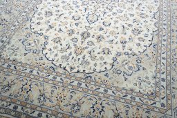 Close-up detail of New Kashan rug from Iran / Persia showing Wool weave