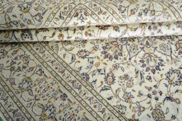 Close-up detail of 2000s Kashan rug from Iran / Persia showing Wool weave