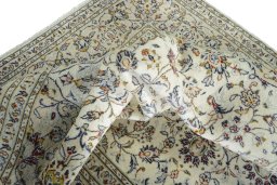 Surface texture of 2000s Kashan rug with natural Wool and intricate pattern
