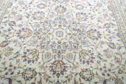 Central medallion detail of 2000s Kashan rug from Iran / Persia