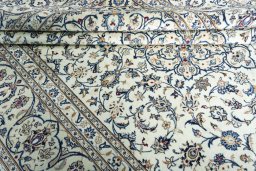 Close-up detail of 2000s Kashan rug from Iran / Persia showing Wool weave