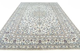Surface texture of 2000s Kashan rug with natural Wool and intricate pattern
