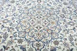 Central medallion detail of 2000s Kashan rug from Iran / Persia