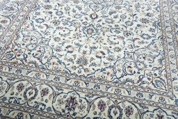 Close-up detail of 2000s Kashan rug from Iran / Persia showing Wool weave