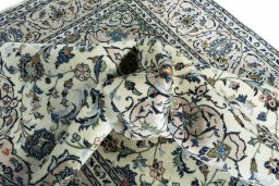 Surface texture of New Kashan rug with natural Wool and intricate pattern