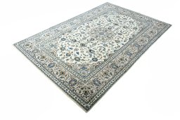 Corner detail of New Kashan rug showing border pattern and Wool pile