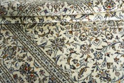 Close-up detail of 2000s Kashan rug from Iran / Persia showing Wool weave