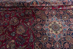 Surface texture of 1930s Kashan rug with natural Cork and intricate pattern