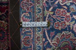Central medallion detail of 1930s Kashan rug from Iran / Persia