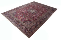 Corner detail of 1930s Kashan rug showing border pattern and Cork pile