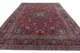 Surface texture of 1930s Kashan rug with natural Cork and intricate pattern