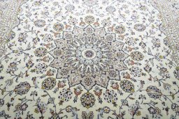 Central medallion detail of 2000s Kashan rug from Iran / Persia