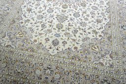 Close-up detail of 2000s Kashan rug from Iran / Persia showing Wool weave