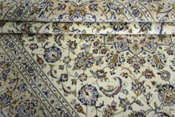 Close-up detail of New Kashan rug from Iran / Persia showing Wool weave