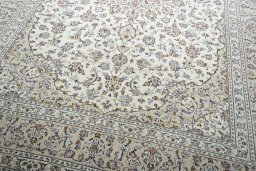 Close-up detail of 2000s Kashan rug from Iran / Persia showing Wool weave
