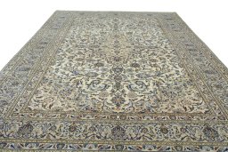 Surface texture of 2000s Kashan rug with natural Wool and intricate pattern