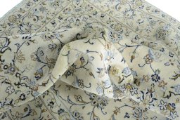 Surface texture of New Kashan rug with natural Wool and intricate pattern